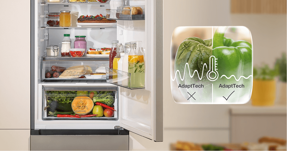 Otwarta lodówka Gorenje BigVolume i papryka podzielona na pół - po lewej zgniła, po prawej świeża dzięki systemowi AdaptTech
