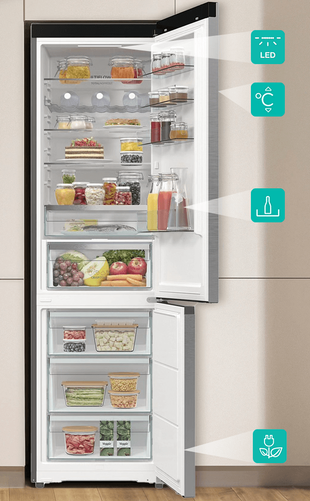 Otwarta lodówka do obudowy Gorenje z wyszczególnionymi elementami: oświetlenie LED, panel sterowania, sprężarka i półki XXL