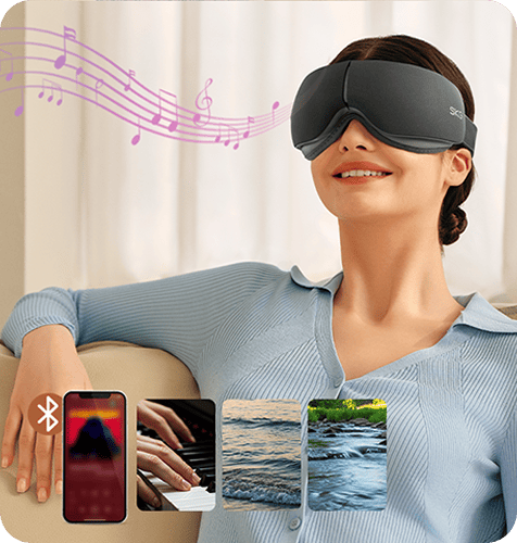 Kobieta uśmiecha się, używając szarego masażera oczu SKG ES500 z wizualizacją muzyki i łącznością Bluetooth