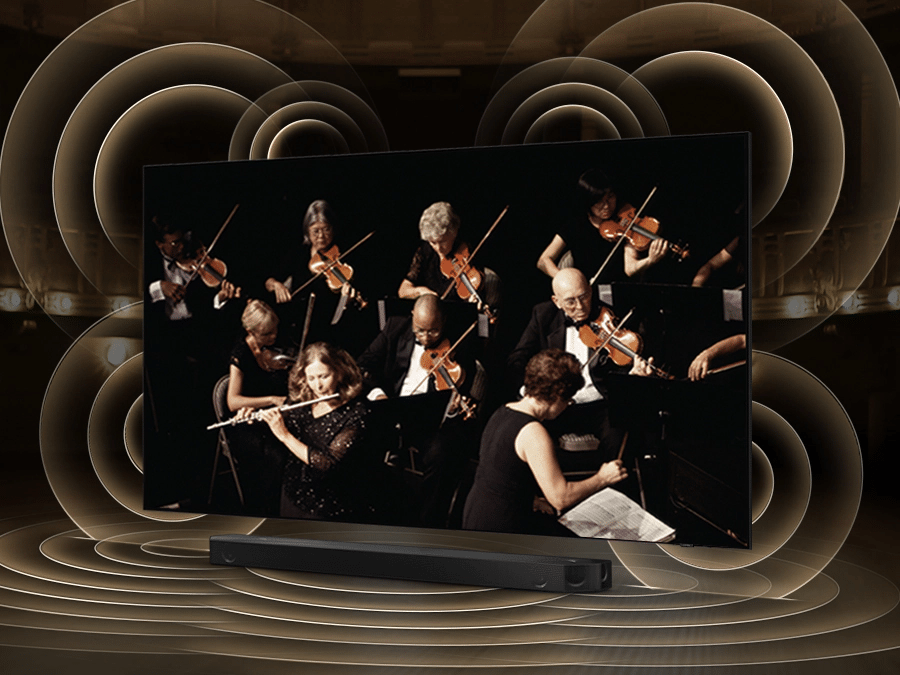 Symulacja rozchodzenia się fal dźwiękowych z telewizora i soundbara grających równomiernie dzięki technologii Q Symphony. Q80BATXXH